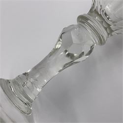 Three 18th century wine glasses comprising a plain stemmed glass with bell shaped bowl and conical folded foot H16cm, another plain stemmed glass with ogee bowl and folded foot and a Continental glass with gilt faceted bowl, decorated with male figure within a landscape, on a clear Silesian seven sided cut stem (3)