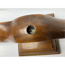 Early 20th century novelty small propeller mantle clock reputedly made by an apprentice at Blackburn Aircraft Works, Beverley & Hull in 1914, the mahogany case loosely inset with a WW1 DOXA Royal Flying Corps pocket watch, the black dial inscribed ' 30-Hour Non-Luminous Mark V.' number BE11653 with subsidiary seconds dial, the back marked with a capital 'A' above a broad arrow, mounted on a stepped square base L67cm