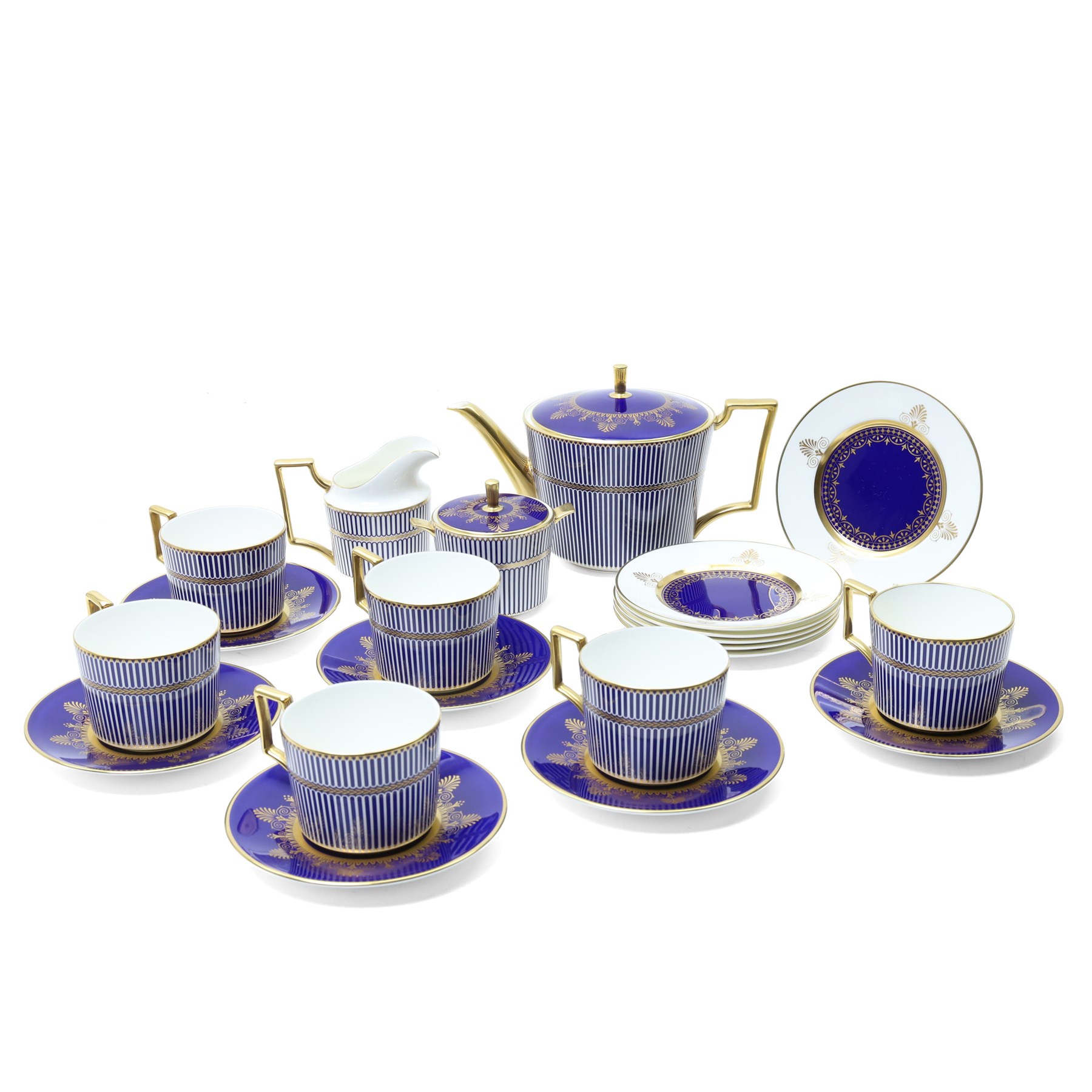 Wedgwood Anthemion Blue pattern tea service richly decorated in blue and gilt with palmette and colonnade forms comprising six cups and saucers, six plates, tea pot, milk jug and sugar box and cover