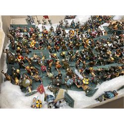 Painted metal wargame figures - over four hundred including Normans and Saxons, Romans, British Tribes etc; together with a quantity of part-painted and unpainted figures, battlefield weapons and accessories etc; average size 25mm