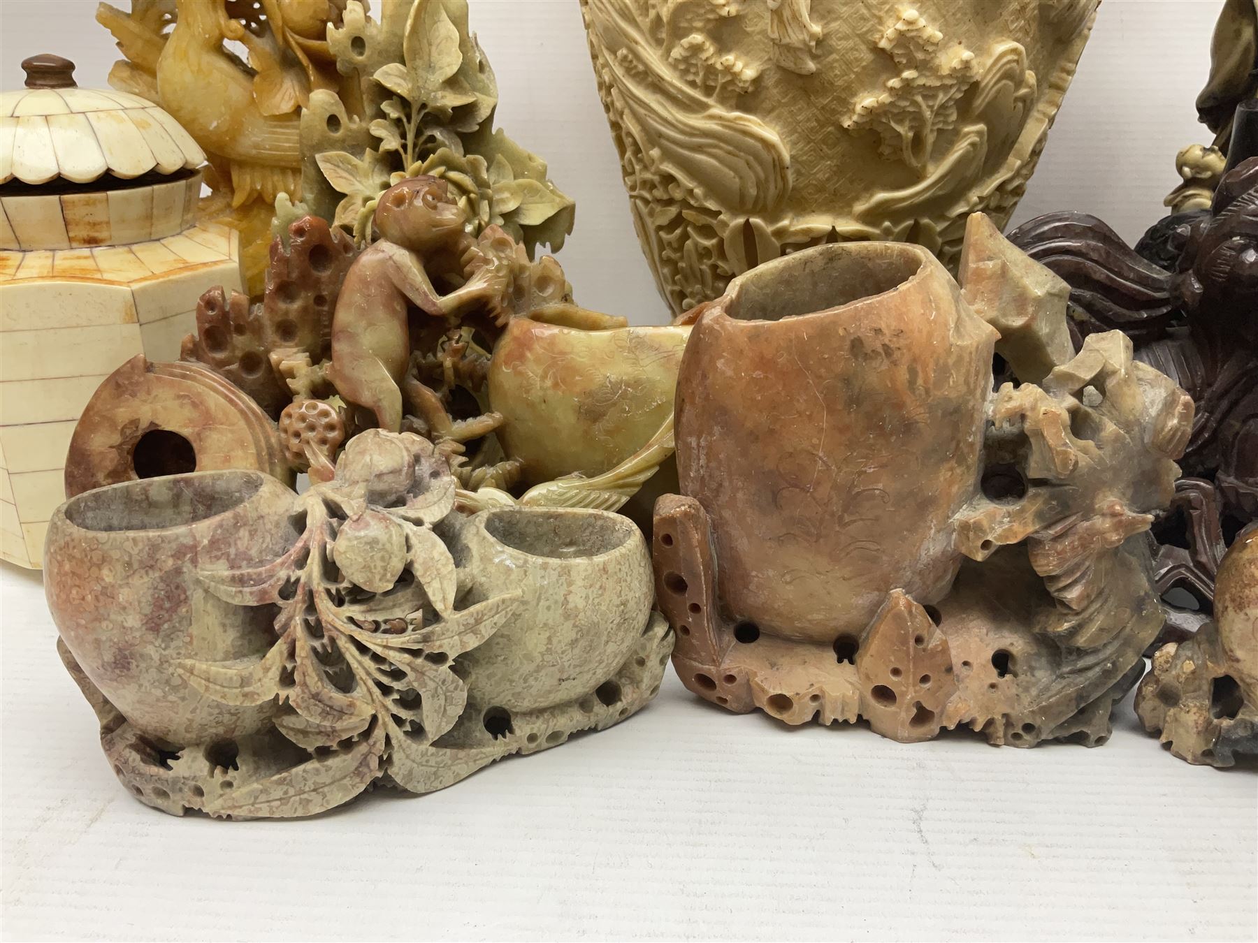 Collection of hardstone and soapstone, including hardstone seal carved temple dogs finial, inscription on base, together with inkwells, vases etc  