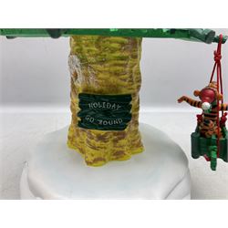 Six Disney Winnie the Pooh Christmas snow globes, comprising large Mr Christmas Holiday Snowfall, An Enchanted Christmas, It's A Small World Christmas 1994,  Tree Trimming, 1995 Christmas At Our House and Christmas Band Concert, together with Mr Christmas Holiday Go Round, all with boxes (7)