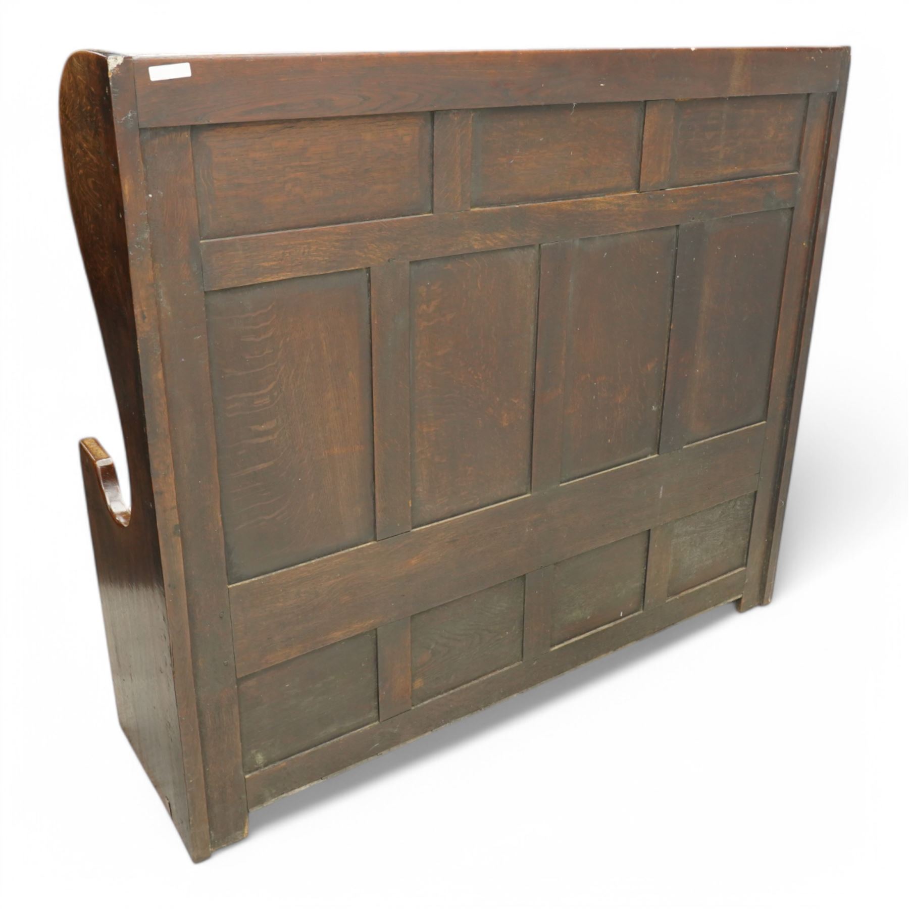 18th century design oak hall bench or settle, tall panelled back decorated with carved arcade, on two shaped end supports, hinged box seat opening to reveal a storage compartment, on a panelled base