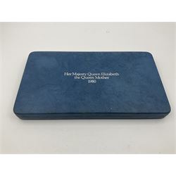 The Royal Mint silver proof seven coin set, comprising United Kingdom and six Commonwealth crowns, commemorating 'Her Majesty Queen Elizabeth The Queen Mother's 80th Birthday', cased with certificate