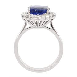 18ct white gold oval sapphire and round brilliant cut diamond cluster ring, hallmarked, sapphire approx 3.50 carat, total diamond weight approx 0.90 carat