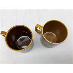 Collection of 1970s Hornsea mugs designed by John Clappison, comprising six Train Robber pattern examples together with owl patterned example on dark teal ground, and further example decorated with stylised hen and chick and egg, approx 9cm, together with four small cup bowls, all with stamped Hornsea marks beneath