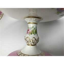 Victorian Copeland, Botanical dessert service, decorated with floral sprigs to the centre with a pink and gilt border, comprising five comports and seven plates, largest comport H20cm, plate D22cm