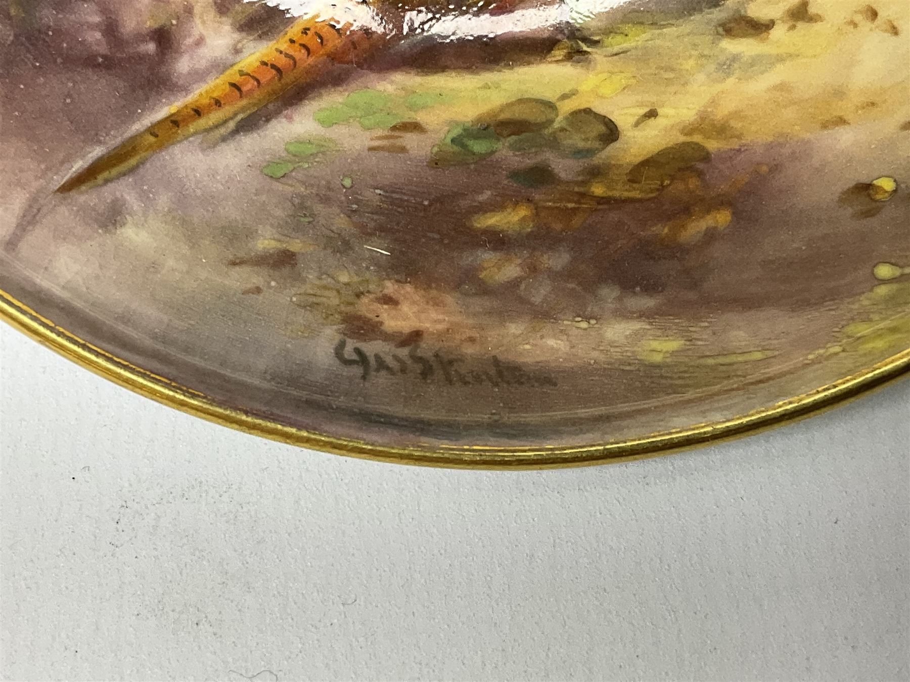 1938 Royal Worcester circular pedestal pin dish, decorated with pheasants in a landscape by James Stinton, with printed mark beneath, D10.5cm