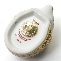 Three Royal Crown Derby paperweights, comprising two of Bramble the Hedgehog, with gold stopper, with boxes, and one of a Woodland Badger, with gold stopper, boxed (3)
