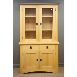  Beech bookcase on cupboard, projecting cornice, two glazed doors enclosing shelves above two drawers and two cupboard doors, W109cm, H190cm, D42cm    