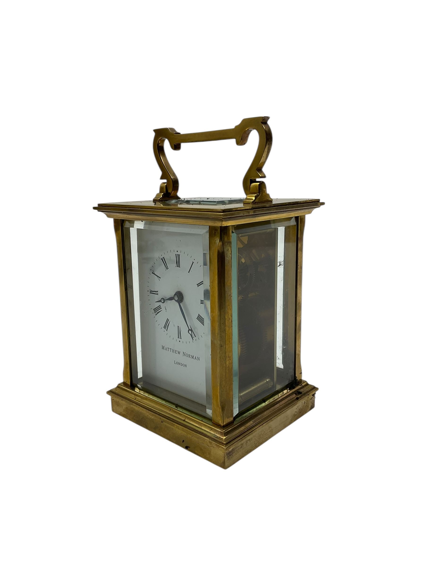 Matthew Norman-20th century brass cased carriage clock with an enamel dial, roman numerals and steel hands, single train timepiece movement with a lever platform escapement.