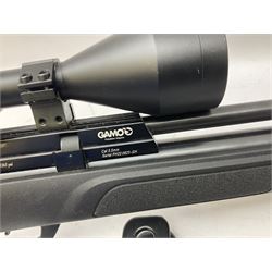 Gamo Phox PCP .22 air rifle with thumbhole pistol stock and 3-9x56 telescopic sight, No.PH22 0823-GH, L102cm overall; in hard carrying case with manual; together with boxed Gamo hand pump, boxed BSA red dot sight, two spare butts, bi-pod etc