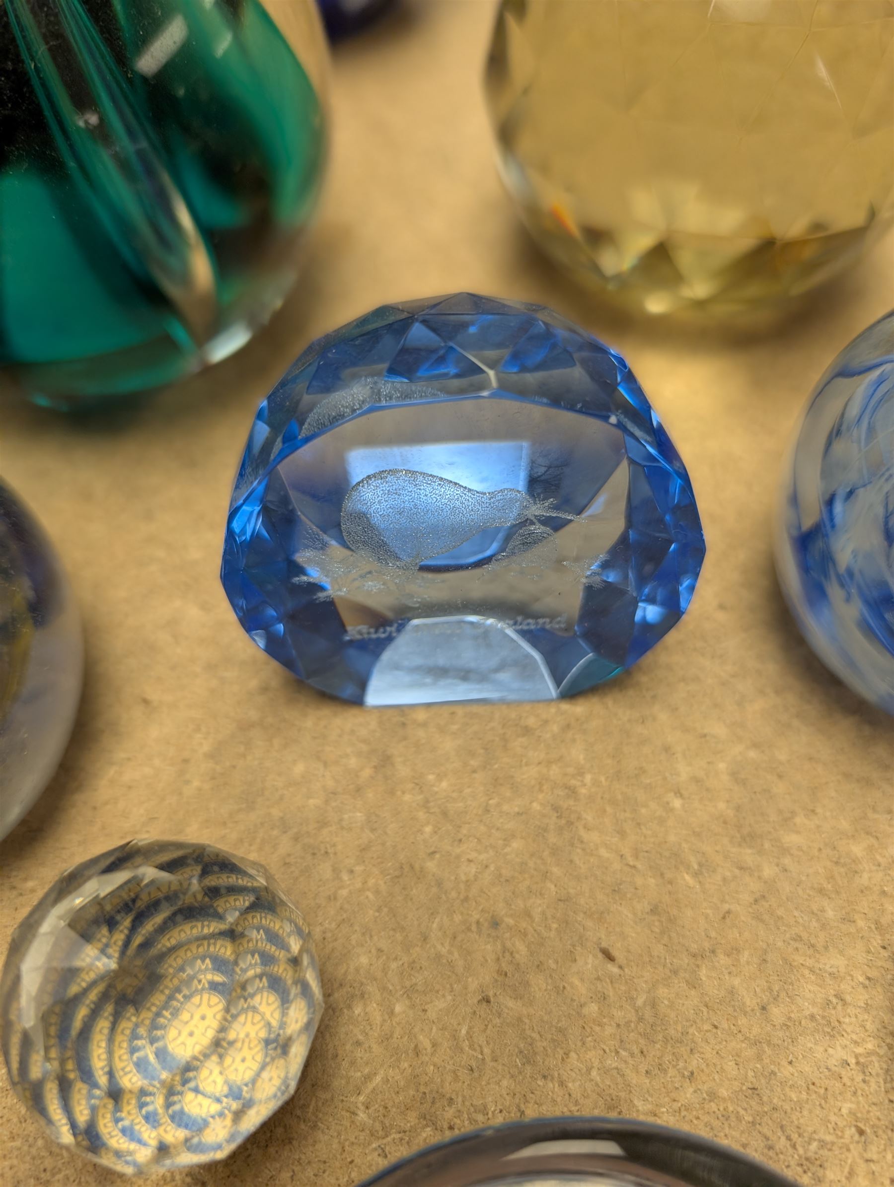 Collection of glass paperweights, including Caithness and Selkirk Glass