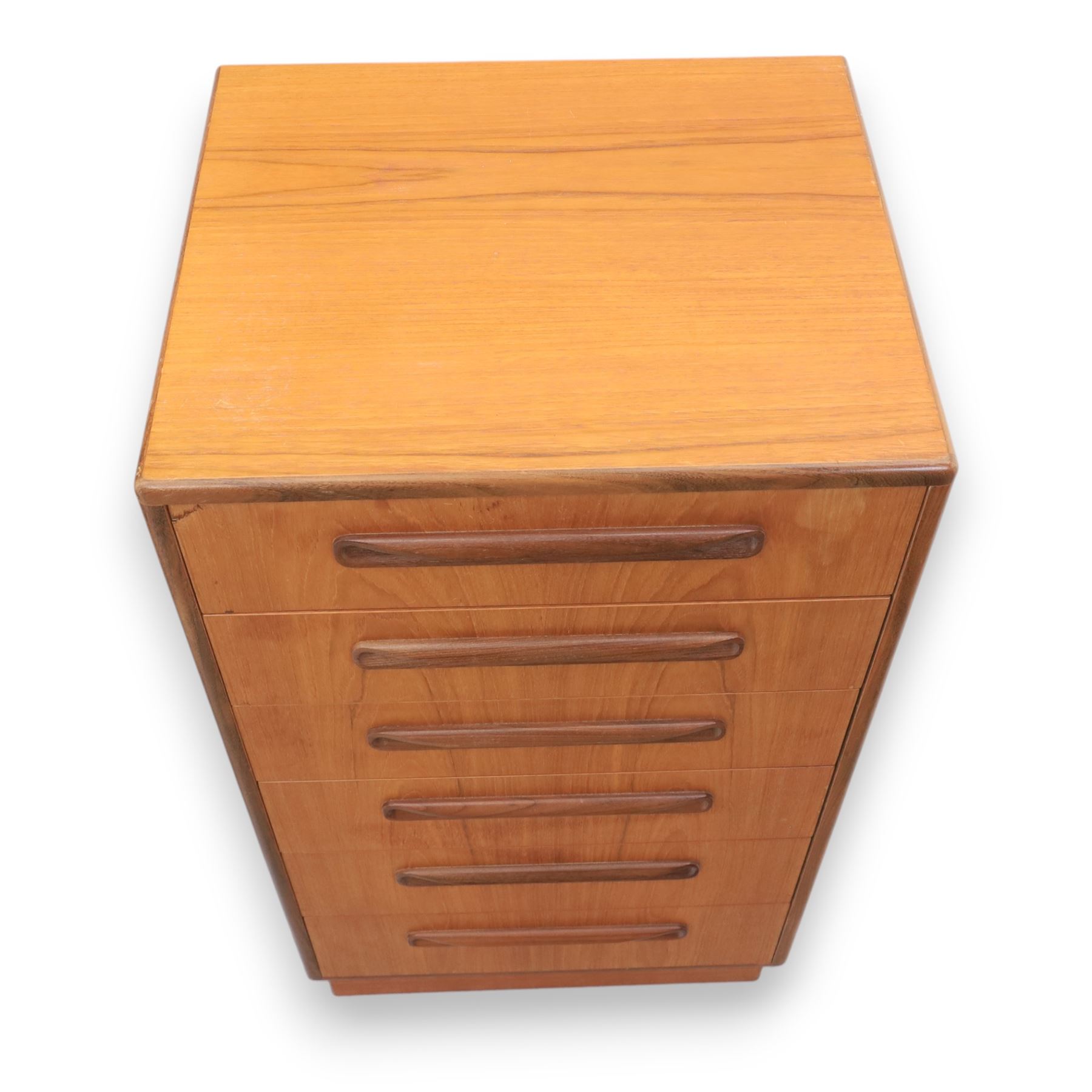 G Plan - 'Fresco' chest of drawers and mirrored dresser, chest of drawers with six drawers, dresser with four graduating drawers and swing mirror surrounded in teak, both raised on a recessed plinth base
Chest H 99cm, W 53cm, D 45cm
Dresser H 136cm, W 72cm, D 48cm