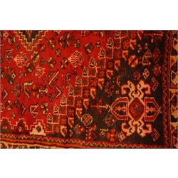  Persian multicoloured rug, triple stepped medallion field with spandrels within repeating border, 250cm x 170cm  