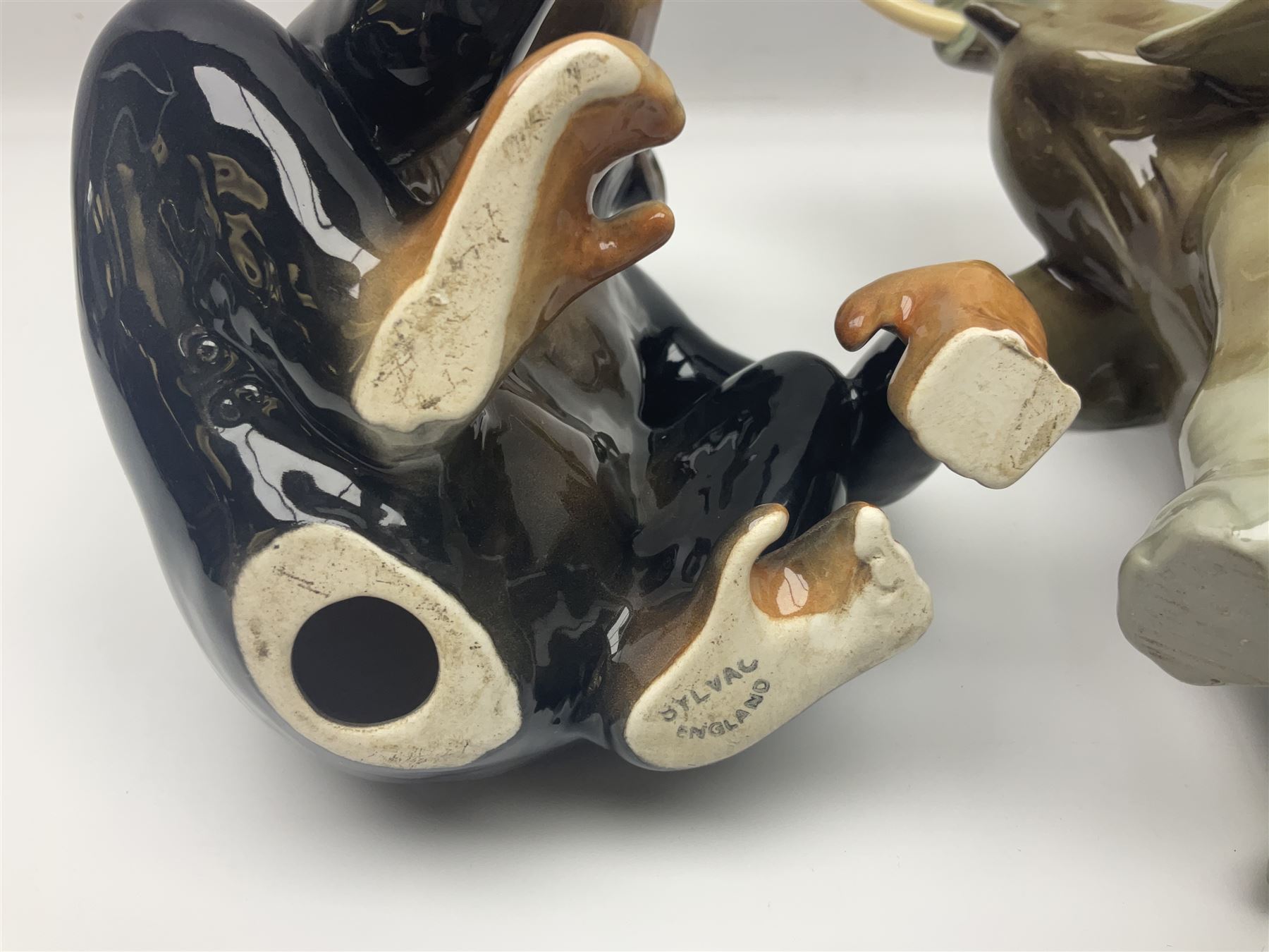 Large Sylvac monkey together with three smaller monkeys, together with Beswick Pigeon no 1383, Melba Ware hippo and baby and Royal Dux elephant 