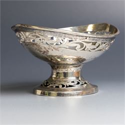 Indian silver bon bon dish, of oval form with pierced foliate decoration to sides and foot, H7cm, W12.5cm