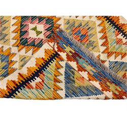 Chobi Kilim ivory ground rug, decorated with multi-colour geometric lozenges, the repeating amber border separated by an indigo band