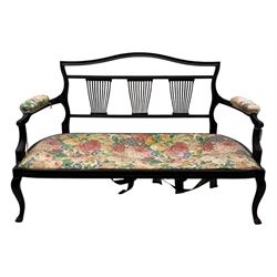 Edwardian mahogany three seater settee, upholstered in floral fabric. Shield back with padded armrests and cabriole legs  