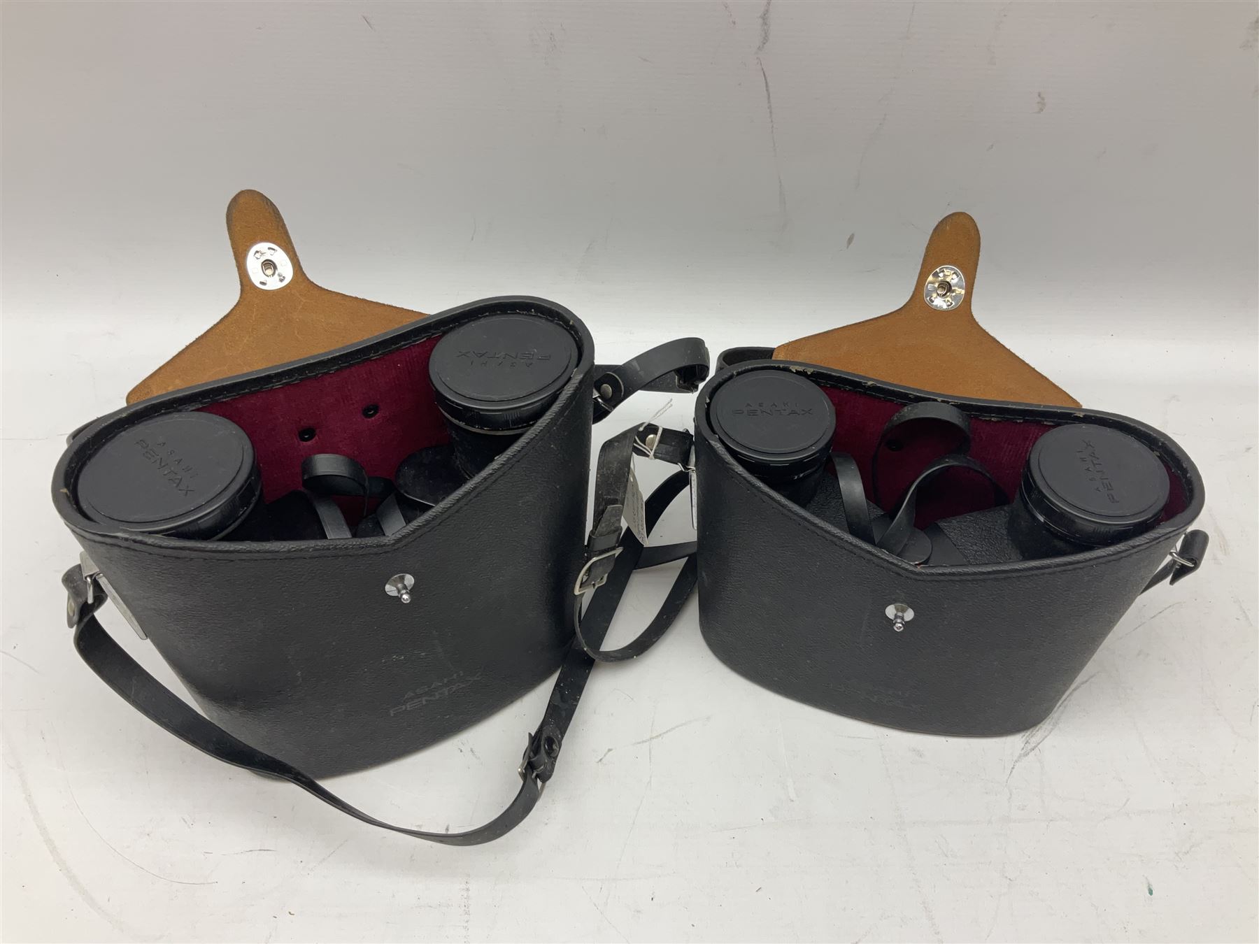 Six cased pairs of Pentax binoculars, comprising 10x50 Field, no. 604, Asahi 7x50, Asahi 10x50, Asahi 8x40, Asahi 16x50,  Asahi 10x50 No. 62611