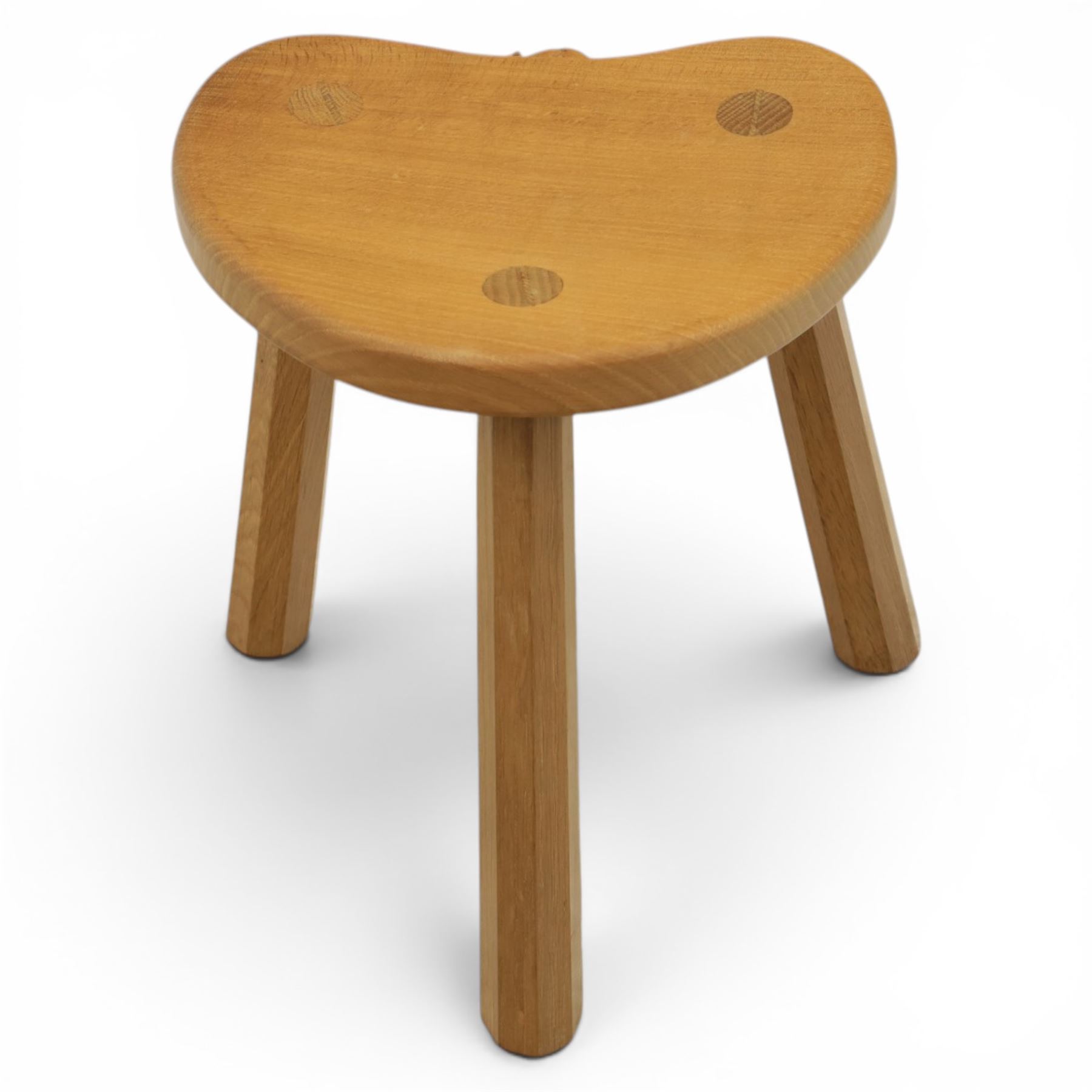 Mouseman - oak three legged calf stool, with carved mouse signature, by the workshop of Robert Thompson of Kilburn