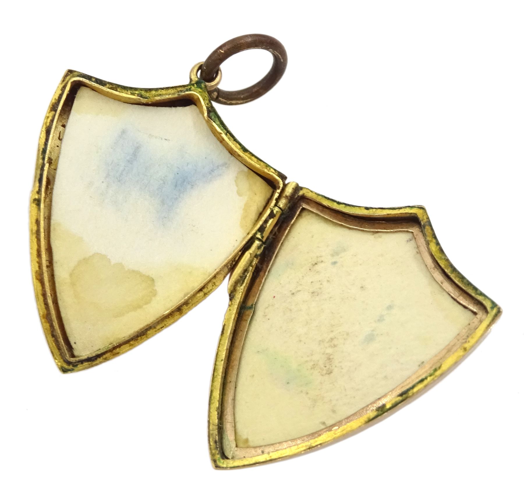 Edwardian 9ct gold shield design locket pendant, with bright cut foliate decoration, Birmingham 1908, gold single stone garnet ring and a 14ct gold knot brooch