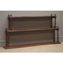  19th century mahogany wall shelve, three moulded tiers, turned supports, W115cm, H60cm, D18cm  