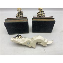 Pair of early-mid 20th century figural composite bookends modelled as harlequin court jesters sat upon stacks of books, H20cm together with a figure of a jester signed Vivian C (3)