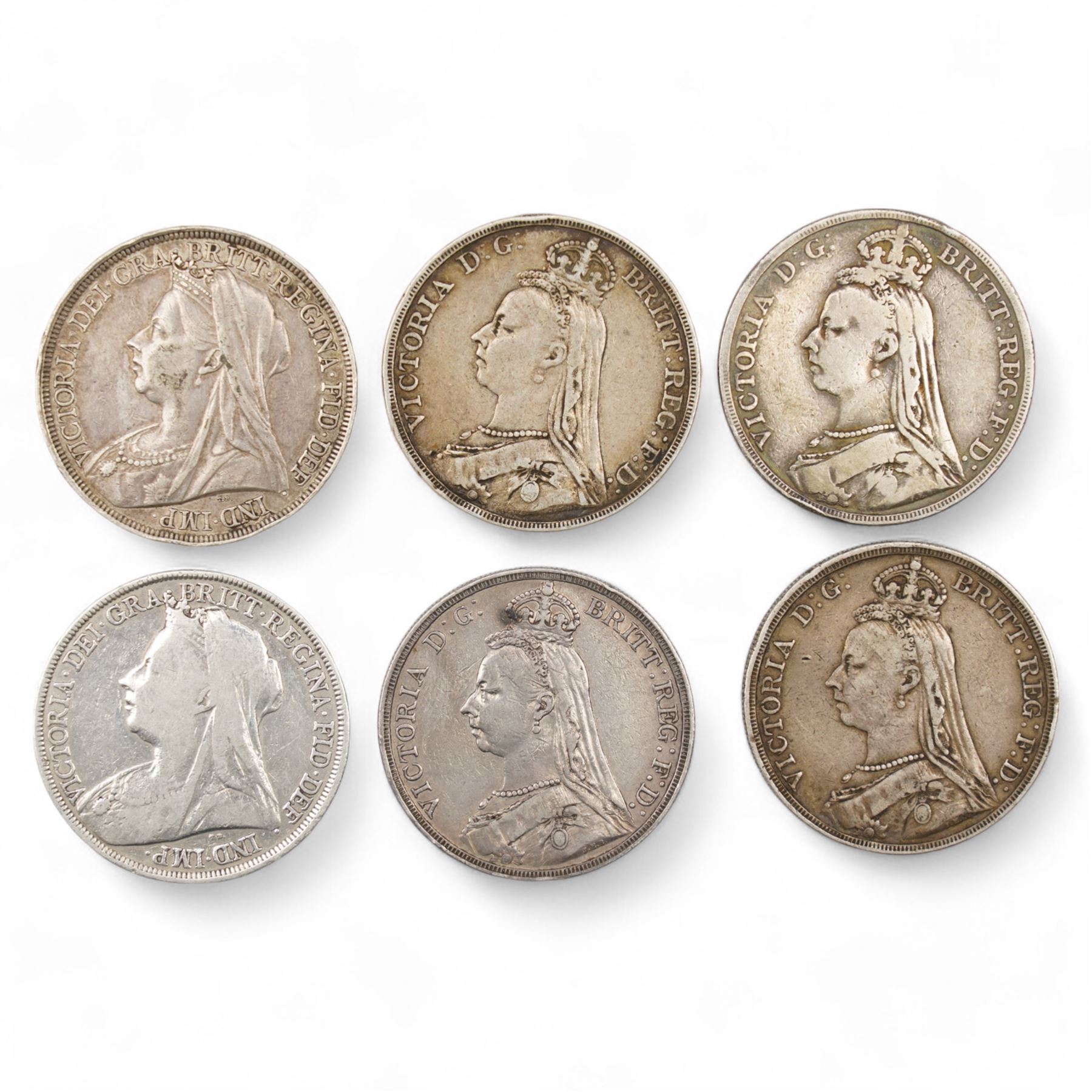 Six Queen Victoria silver crown coins, dated two 1887, 1889, 1890 and two 1896