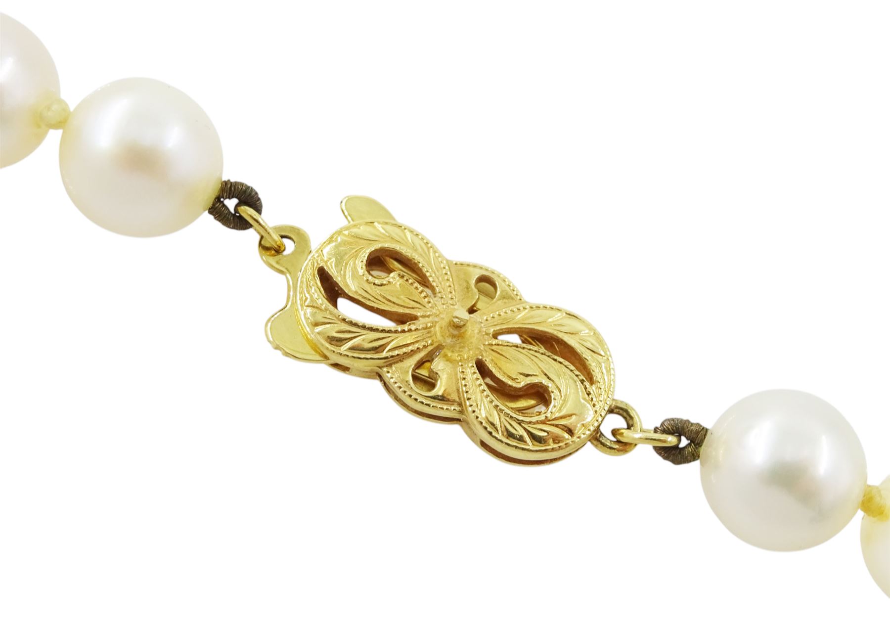 Mikimoto single strand cultured white pearl necklace, with 18ct gold clasp, stamped 750, boxed with certificate dated 1983