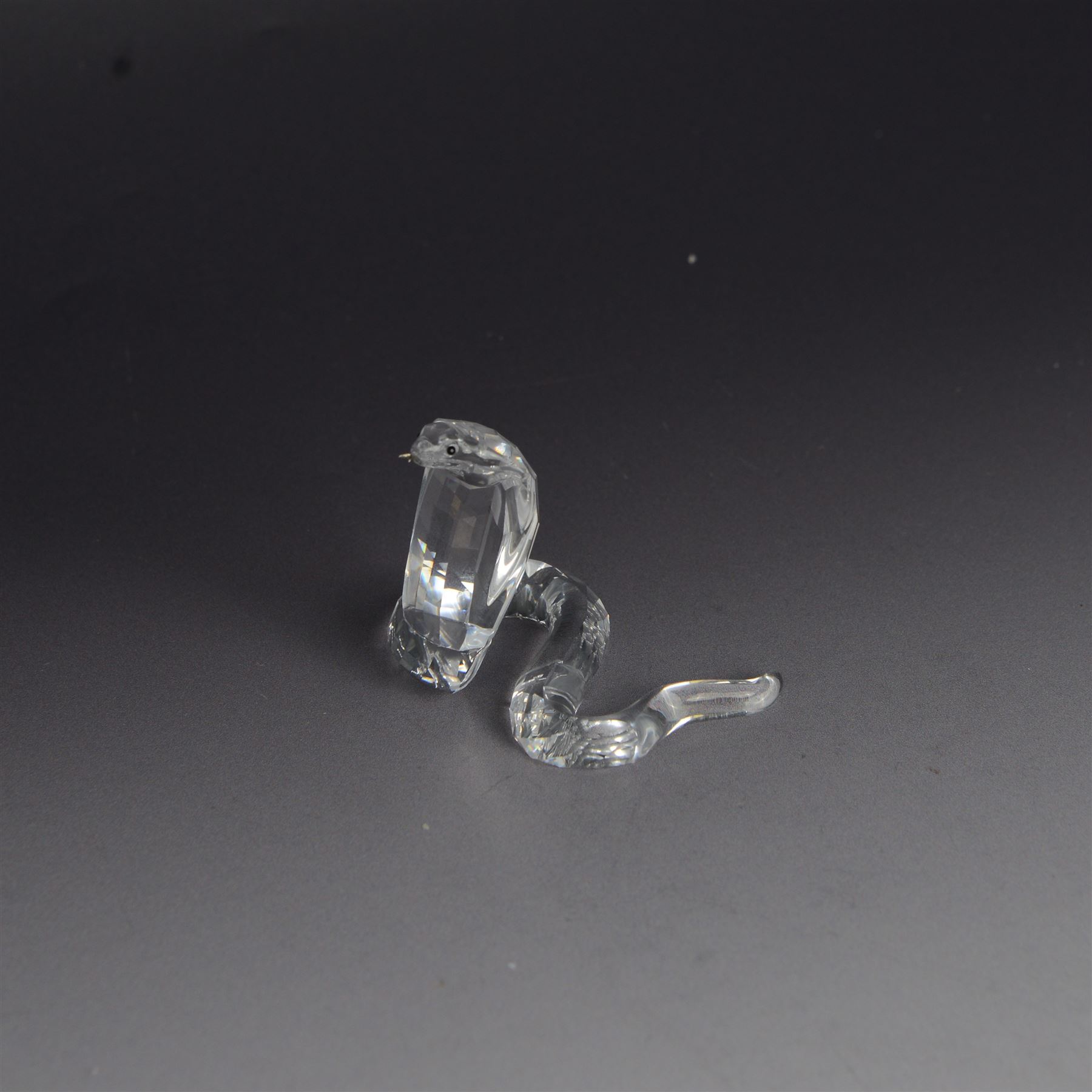 Three Swarovski figures, comprising Giraffe, Cobra and Budgies, all with original boxes  