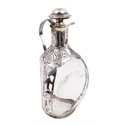 20th century Mexican silver overlaid Dimple whisky decanter/jug with stopper, the glass body overlaid with pierced floral silver decoration, with silver C handle and silver stopper, stamped 925 to base, H23.5cm
