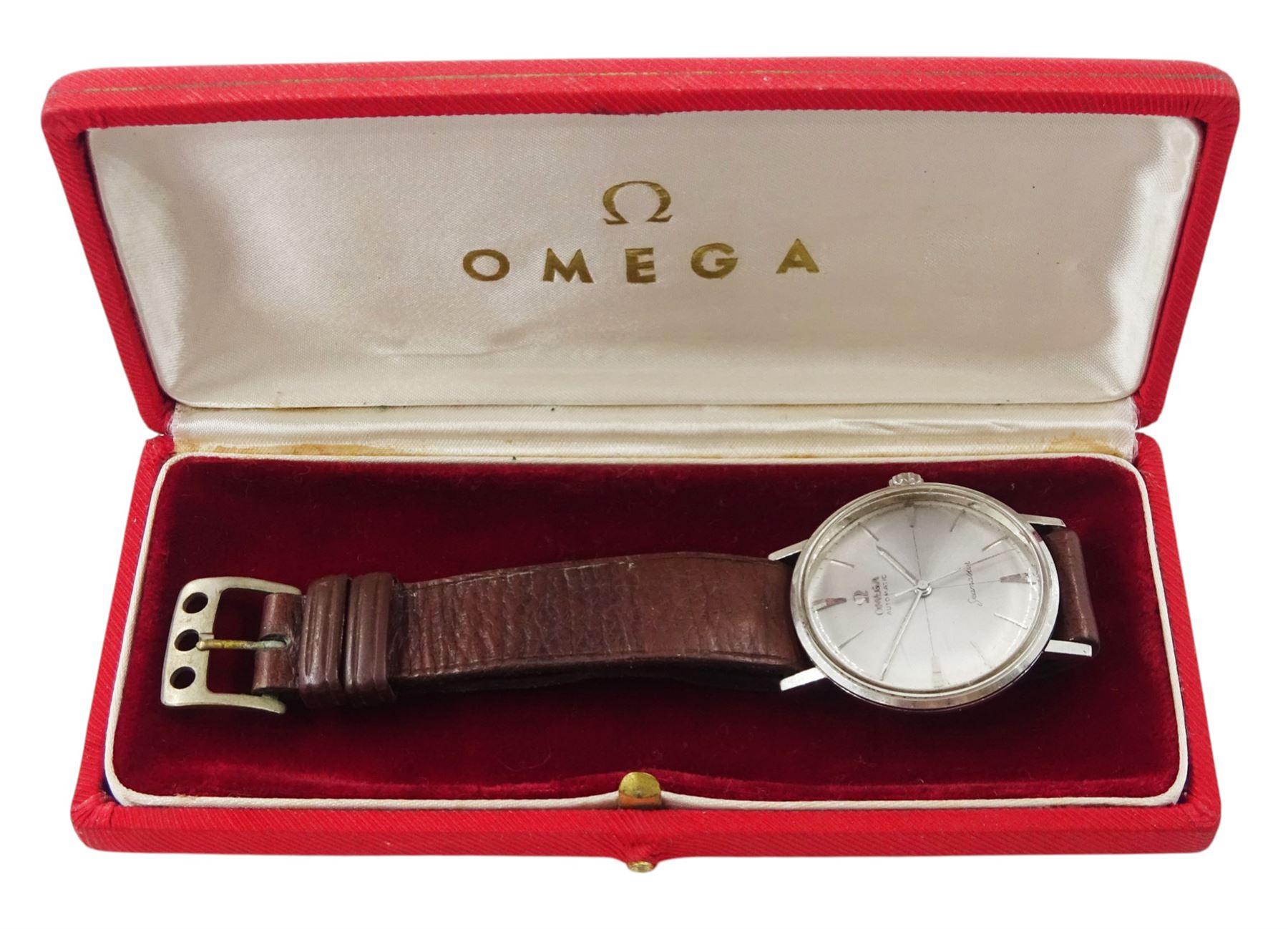 Omega Seamaster gentleman's stainless steel automatic wristwatch, silvered dial with baton and dagger hour markers, on brown leather strap, boxed