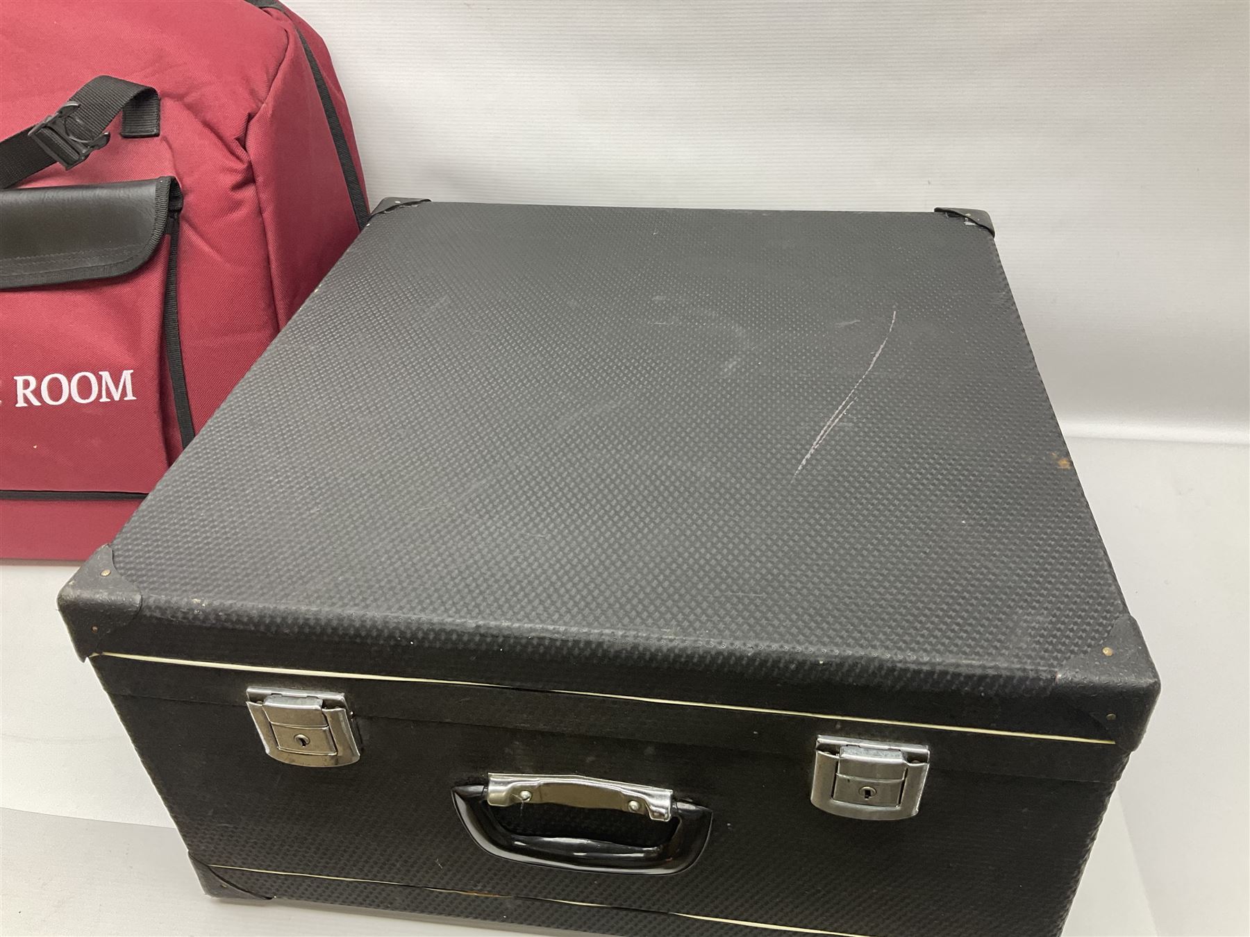 Hsinghai Studio piano accordion with red pearline finish, twenty keys and seventy-two buttons W44cm; in hard carrying case with additional The Music Room soft gig case