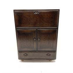 Ercol dark elm drinks cabinet, single fall front unit above two cupboard doors and single drawer 