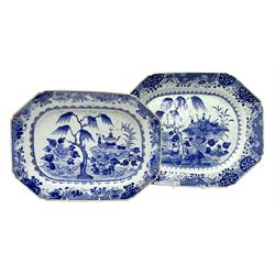 Two late 18th/early 19th century Chinese export blue and white platters, of canted form, decorated with precious objects, willow and chrysanthemum, within spearhead and scroll and butterfly borders, largest example W41.5cm, smaller W36cm 
