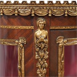 Mid-20th century rosewood vitrine display cabinet, shaped form with cast gilt metal gallery and mounts, enclosed by glazed door with Vernis Martin design panel, fabric lined interior with two glass shelves, on cabriole supports with cast acanthus leaf mounts 