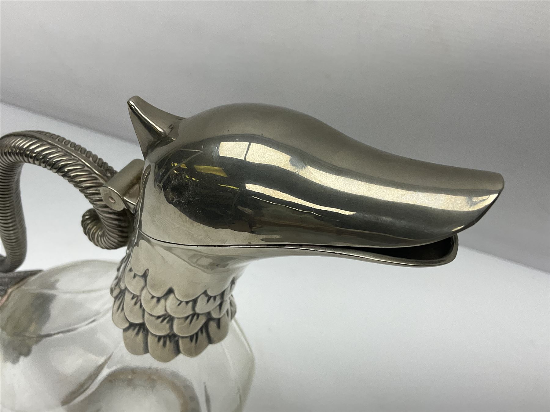 Silea silver plate mounted glass claret jug, in the form of a duck, with makers mark beneath, H26cm