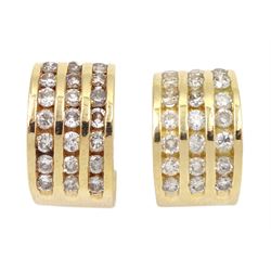 Pair of 14ct gold channel set, three row diamond half hoop stud earrings, stamped