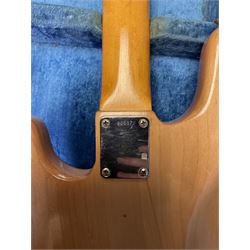 1962 Fender Precision bass guitar; re-finished in natural alder in the 1970s; impressed date code 5NOV62C to end of neck and serial no.90537 to back plate; L115.5cm; in replacement hard carrying case