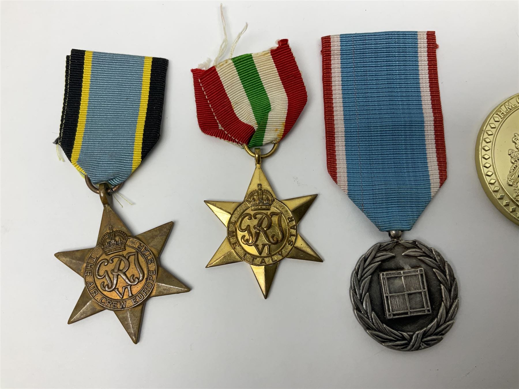 Gaunt & Son Territorial Force Nursing Service cape medal; cased; WW1 British War Medal and 1914-15 Star (names erased); two MID oak leaves; Polish and American medals; eight replica medals including VC, MM, Air Crew Europe Star etc and replica group of five WW2 miniatures etc