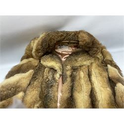 Three ladies fur coats, together with a large collection ladies stoles, including a black fox example