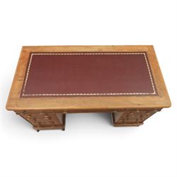 Victorian mahogany twin pedestal desk, rectangular top with red tooled leather writing surface with three frieze drawers, each pedestal with three drawers and castors