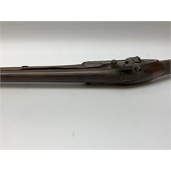 Early 19th century 15-bore flintlock converted to percussion cap fowling piece, the lock stamped T. Richards, walnut half stock with brass fittings including trigger guard with pineapple finial and 91cm barrel with ramrod under L129cm overall
