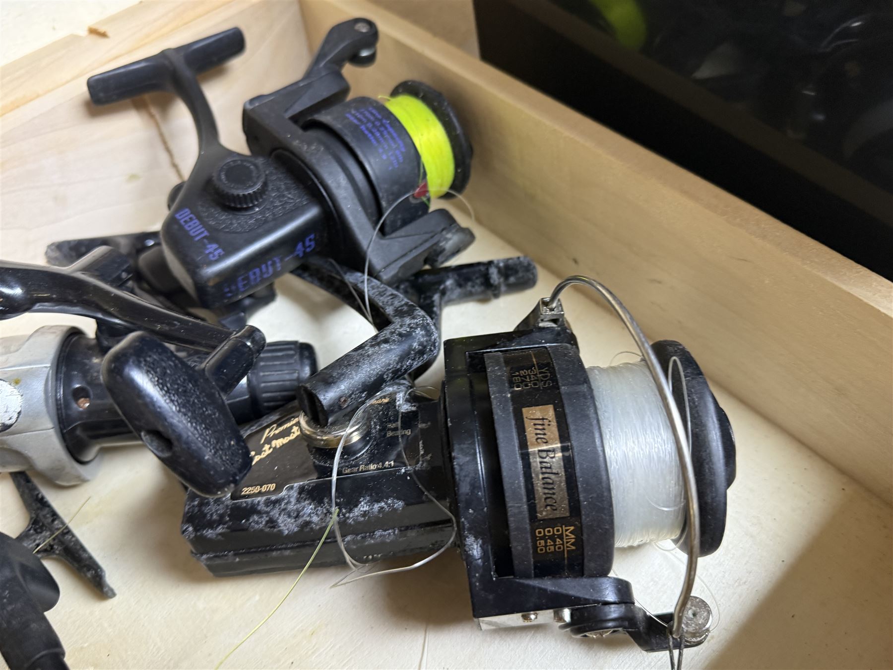 Collection of mostly sea fishing reels, including Mitchell Riptide, Shakespeare Sea Wolf, Daiwa Sealine, Abu Garcia Ambassadeur XLT 1 Synchro , in two boxes