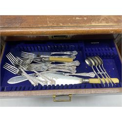 19th century oak cased part canteen of cutlery, to include silver-plated James Deakin & Sons examples, the two hinged doors opening to reveal fitted drawers, with small inlaid bone plaque stating Patent No 1101, H31cm W49cm