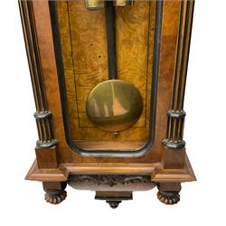 A late 19th century German “Vienna” regulator in a round topped case with a fully glazed door (glass missing) with an eight-day weight driven Gustav Becker movement striking the hours and half hours on a gong, wooden pendulum with a spun brass bob, white two-part enamel dial with seconds dial and steel gothic hands, Roman numerals and minute track. With two brass cased weights.  