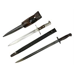 British Enfield 1907 model SMLE bayonet, with 43cm fullered steel blade and metal mounted leather scabbard L58cm overall; and Schmidt-Rubin Model 1918 bayonet the 30cm steel blade marked Elsener Schwyz No.579722; in steel scabbard with leather frog marked G. Bertolini Sellaio Vira/G.Tic 79 L45cm overall (2)