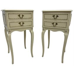 Pair of French classic design cream painted bedside tables, fitted with two drawers, on cabriole supports (W35cm D34cm H69cm); with matching headboard, decorated with moulded flower heads and bell-flower festoons (W233cm H61cm)