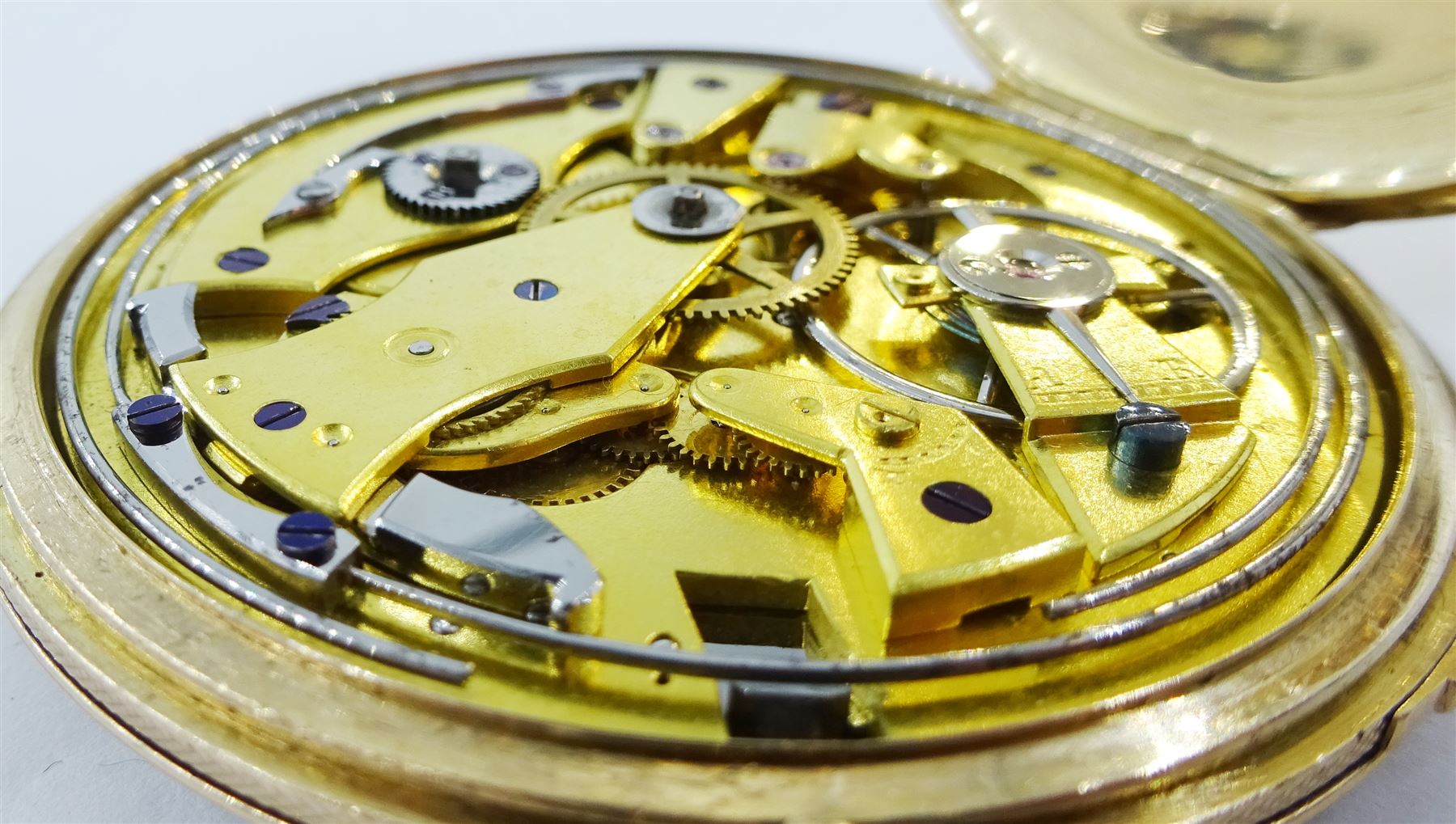18ct gold open face key wound quarter repeating Swiss lever pocket watch by Garni en Pierre, No. 5090, the gold dust cover inscribed 'Echappement Libre a Ancre', plunge repeat in the pendant, silver engine turned dial with Roman numerals and subsidiary seconds dial